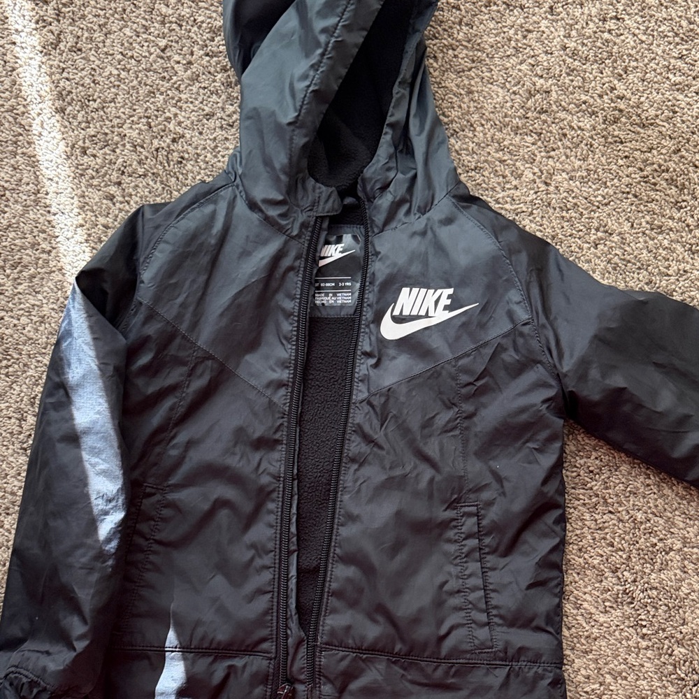 Nike Kids Black Hooded Rain Jacket with White Logo